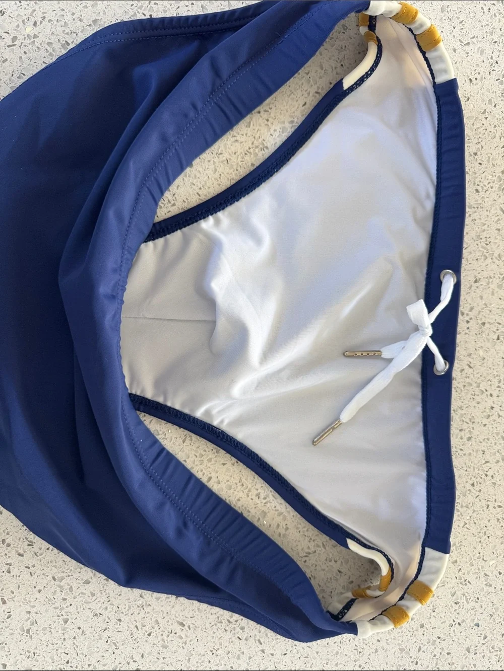Coyote Men's Navy Swim Brief with Gold-Stripe Waist